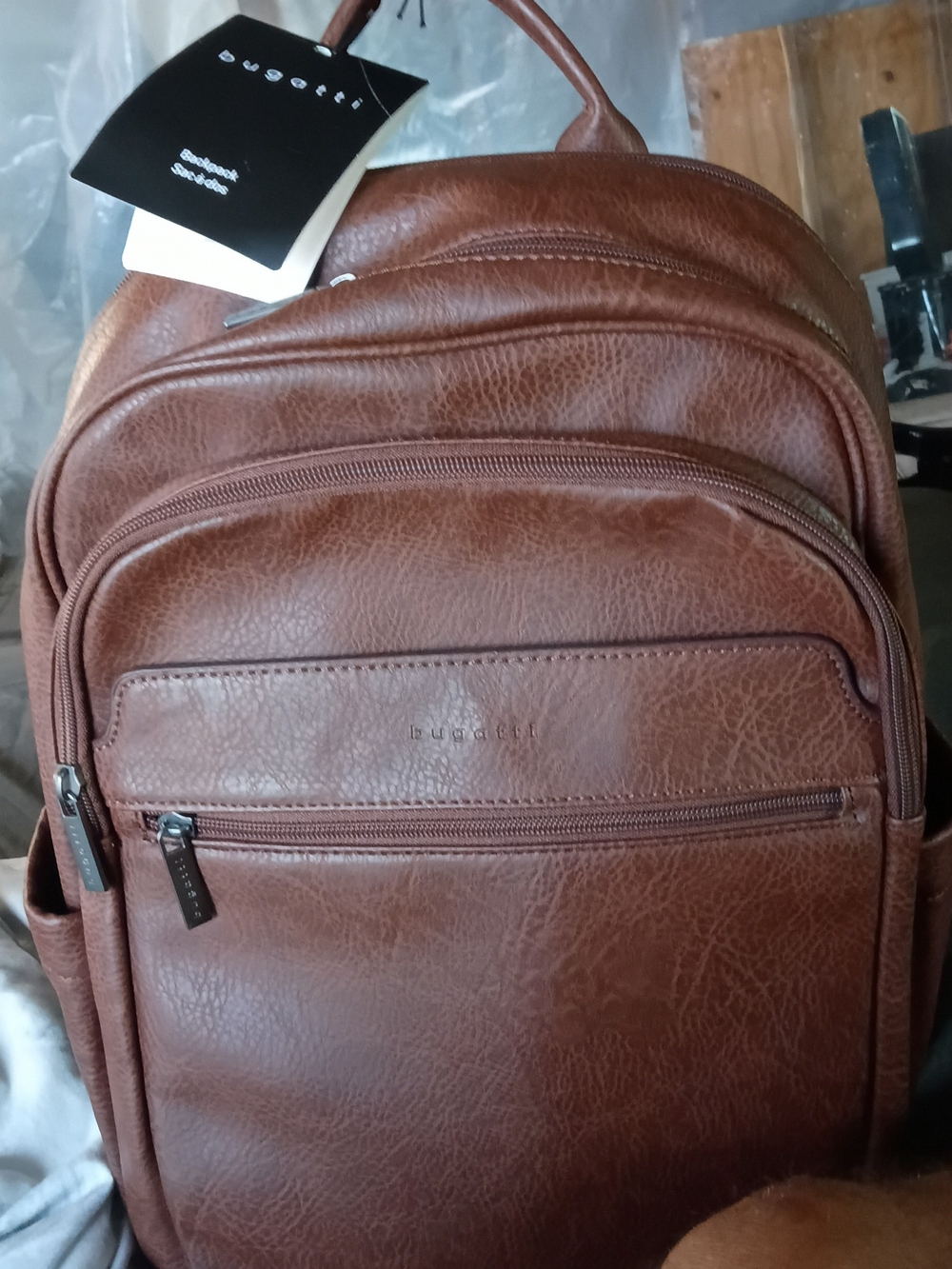 Bugatti Cognac Brown Leather Backpack with Front Zip Pockets